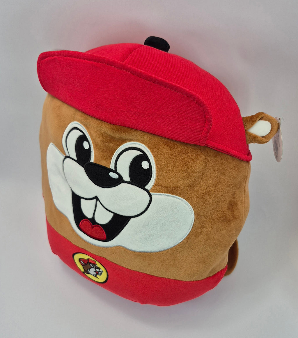 Plush toy with a cartoon face design on a white background