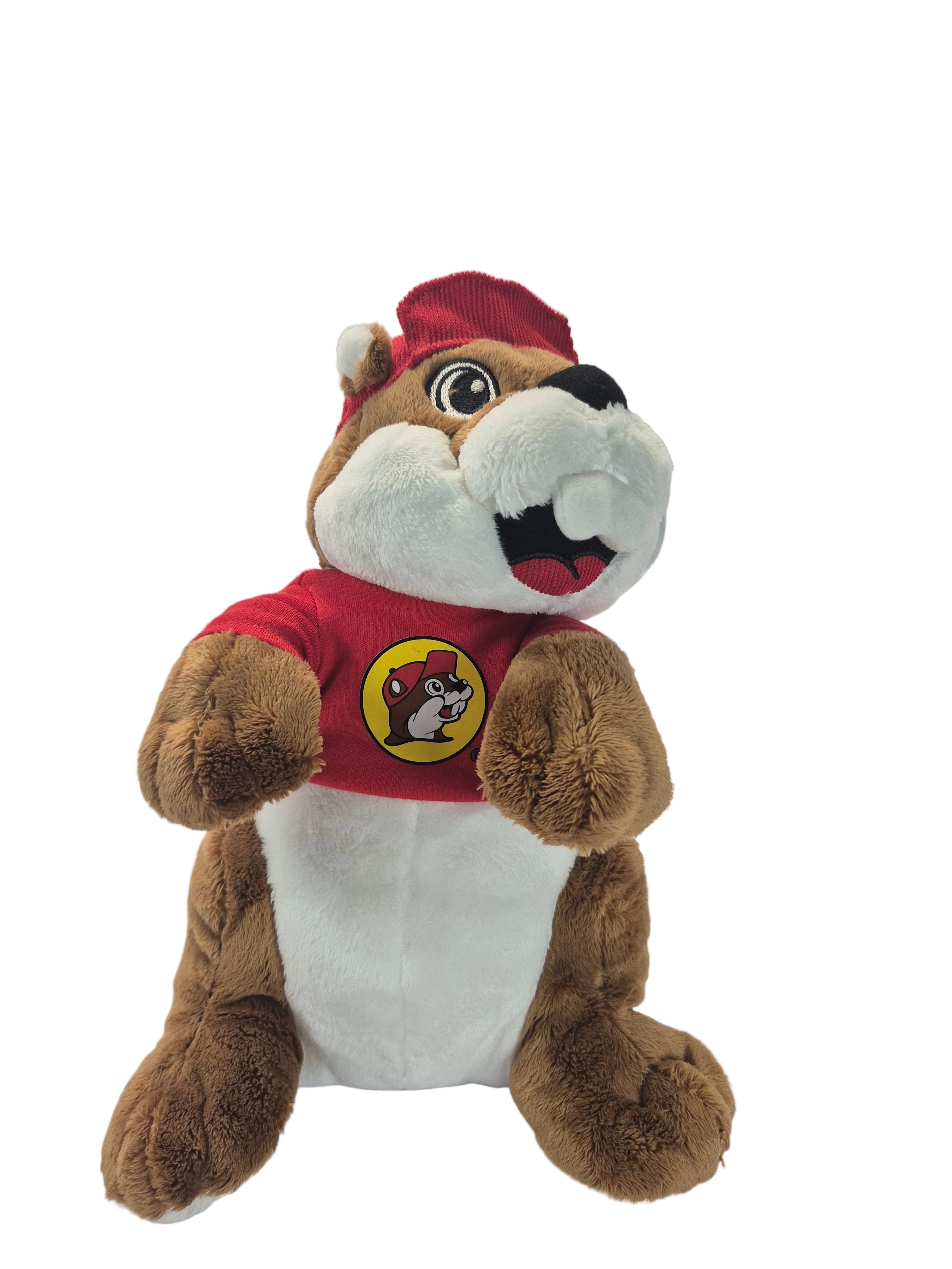 Plush toy resembling a beaver in a red shirt with a logo on a white background