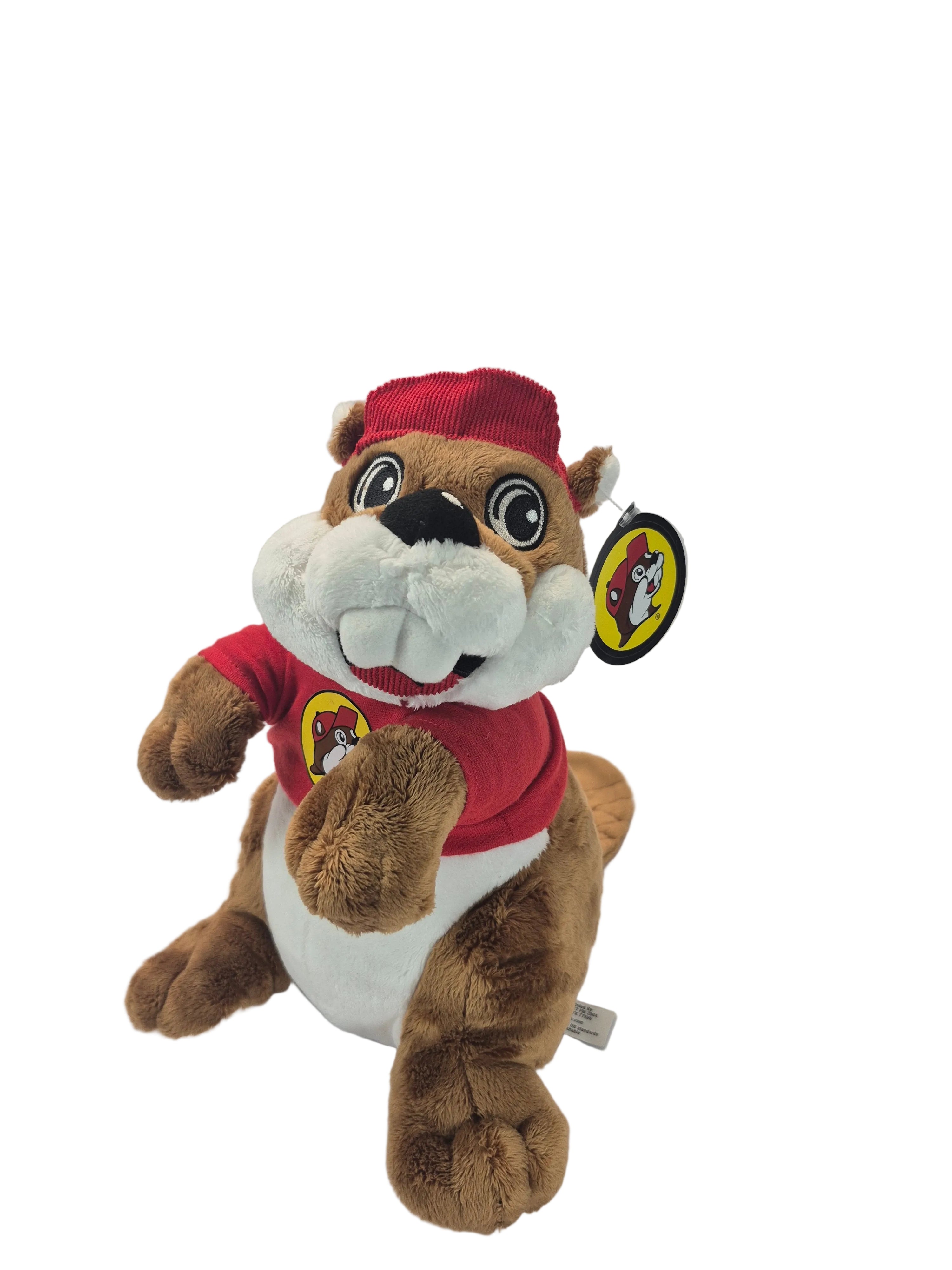 Plush toy beaver wearing a Santa outfit on a white background