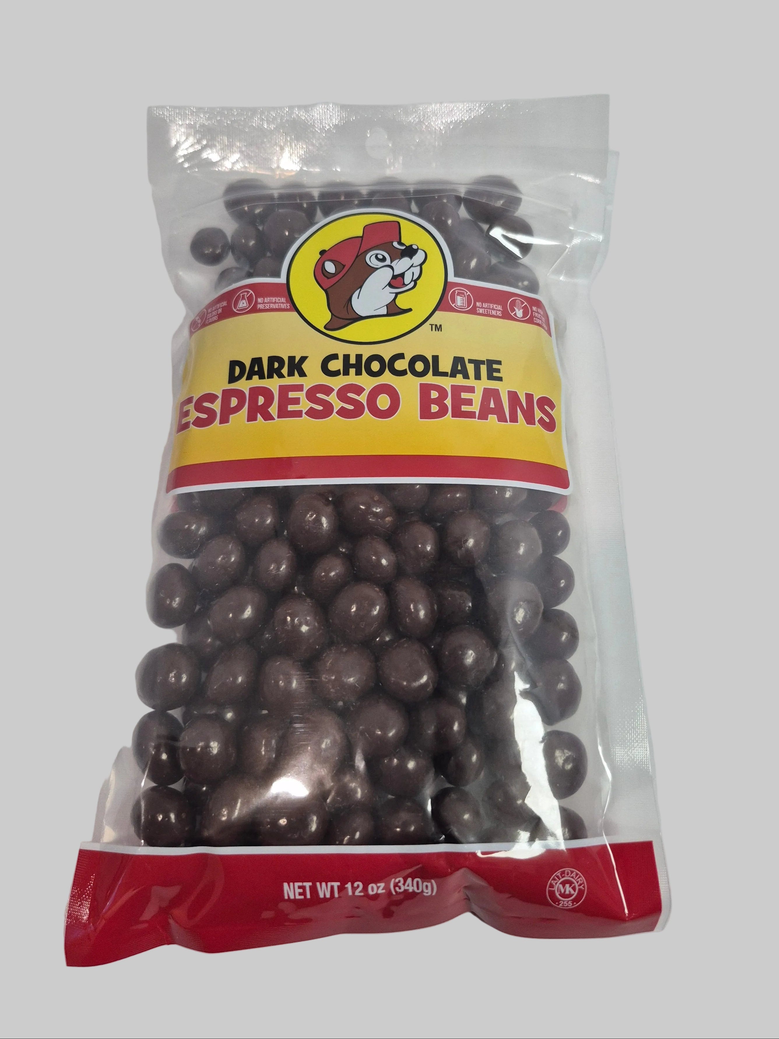 Bag of dark chocolate espresso beans with a visible brand logo on a gray background