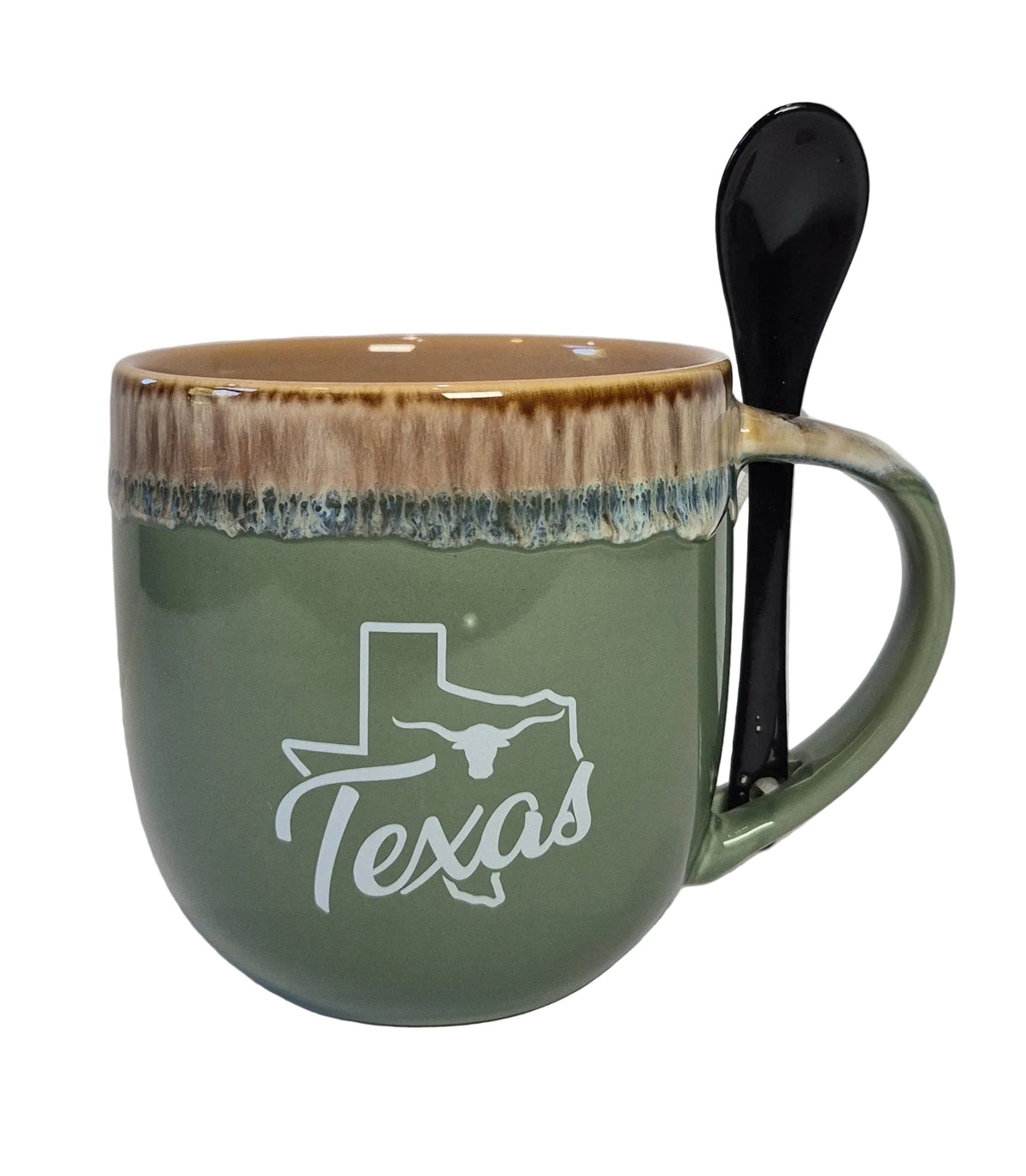 Green mug with 'Texas' design and a black spoon on a white background