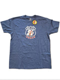 Blue t-shirt with a logo and text on a gray surface