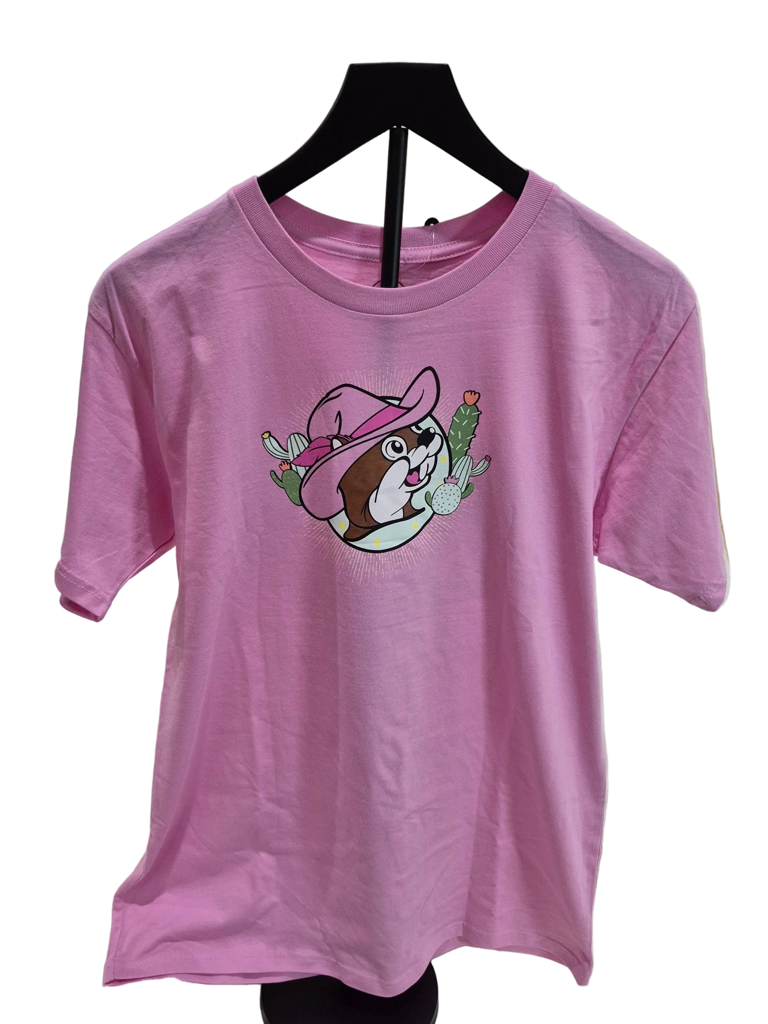 Pink t-shirt with cartoon character on a white surface